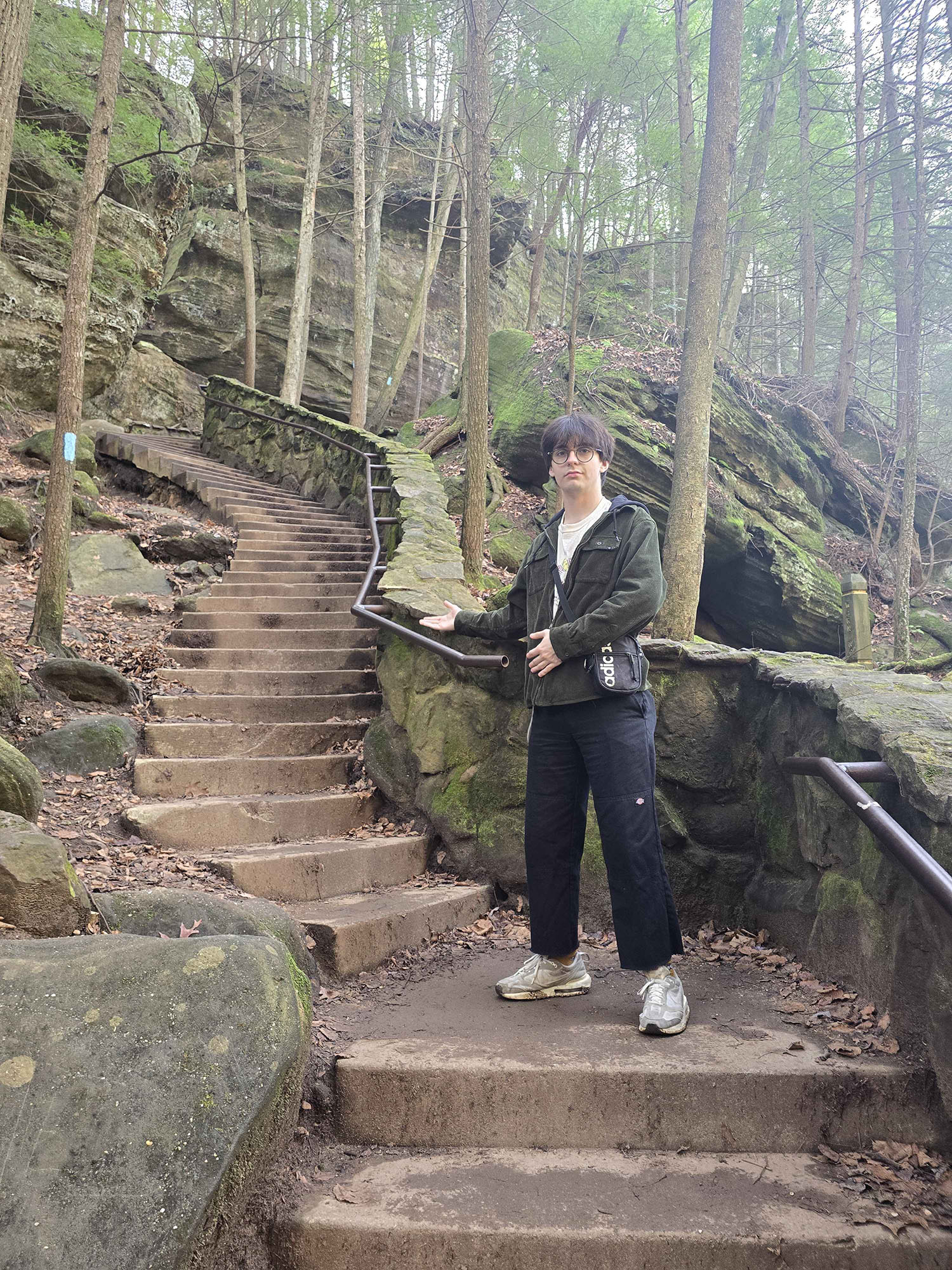 Brayden Karmann ’29 pointing to stairs.