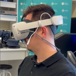 Filippo Moggioli wearing virtual reality glasses to play his game.