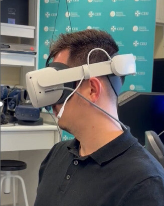 Filippo Moggioli wearing virtual reality glasses to play his game.