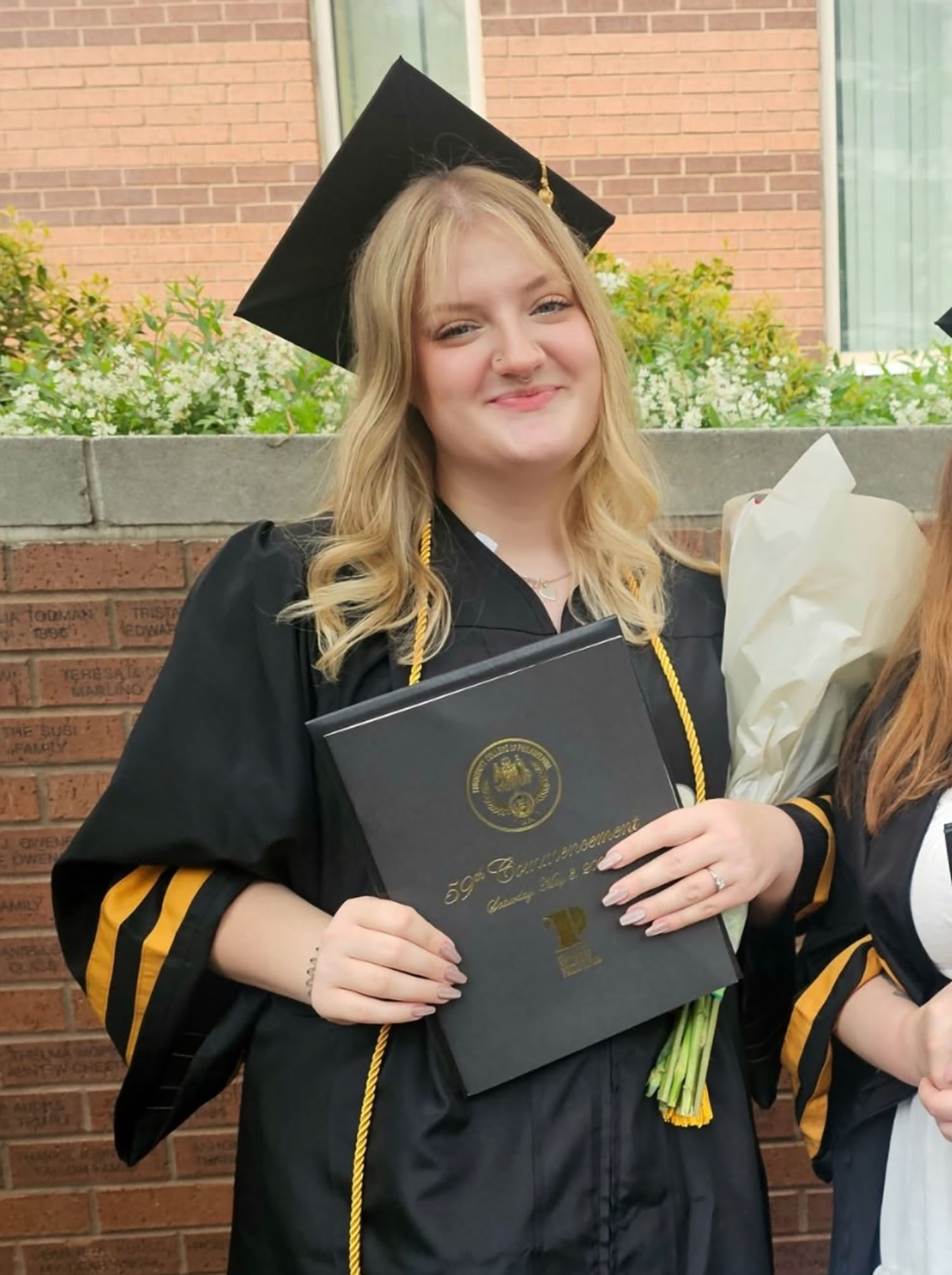 Emily Rooney ’29 at high school graduation.