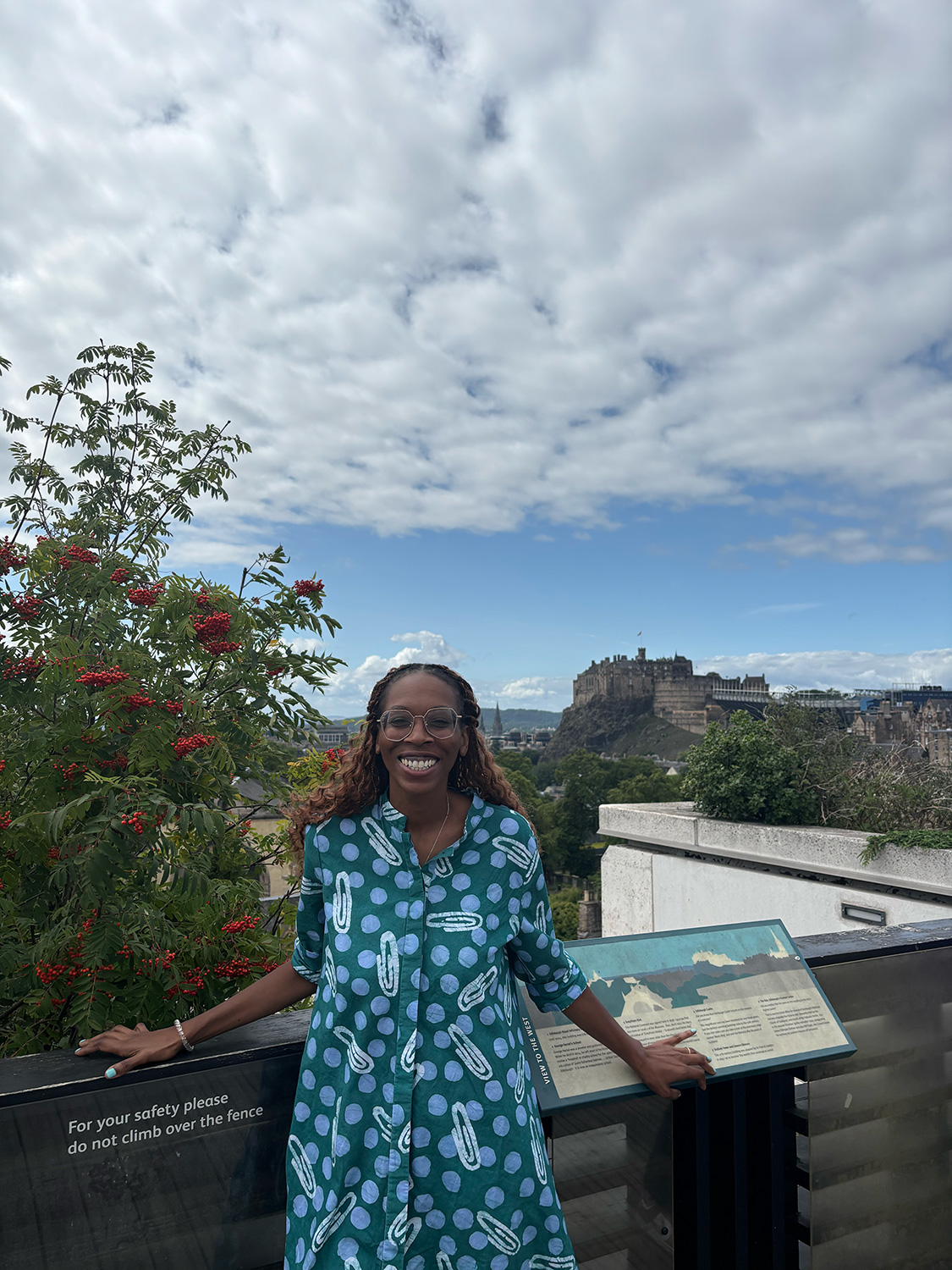 Rowana Abbensetts-Dobson ’26MFA with a castle in the background.