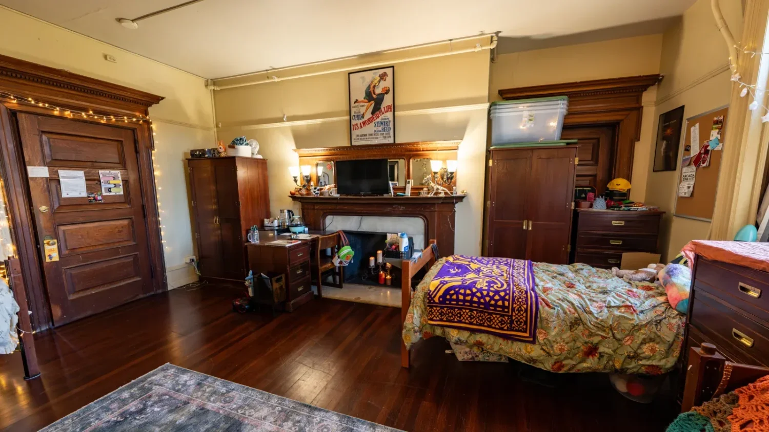 A view of one of the bedrooms in Grey Towers Castle, which has been decorated with string lights.