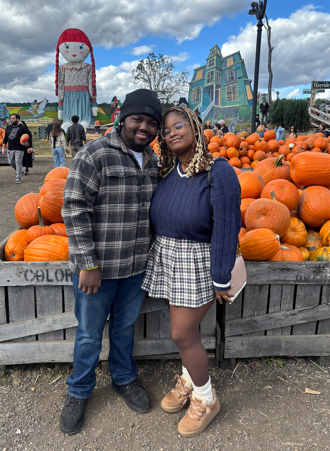 Makiyah Smith ’28 and another student at a pumpkin patch.