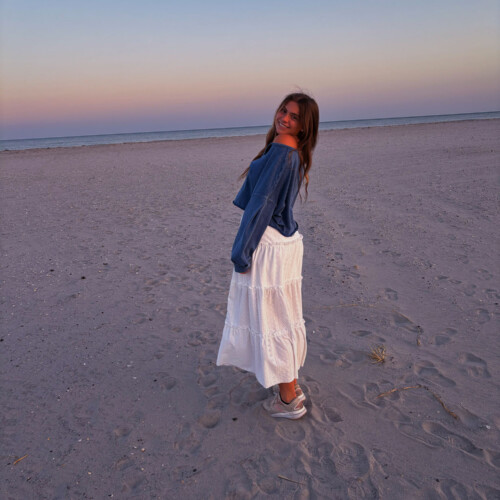 Jenna Carr ’29 on the beach.