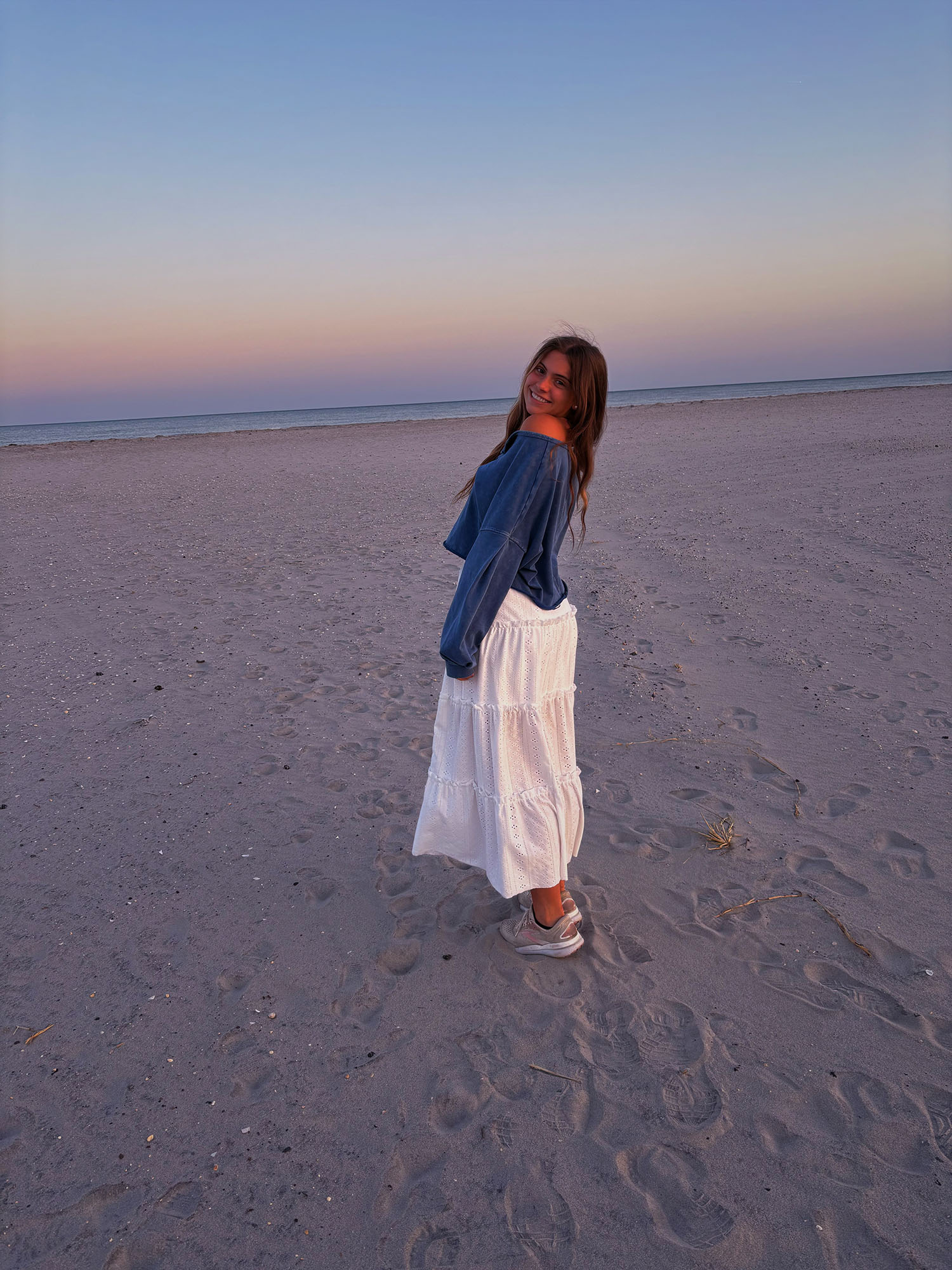 Jenna Carr ’29 on the beach.