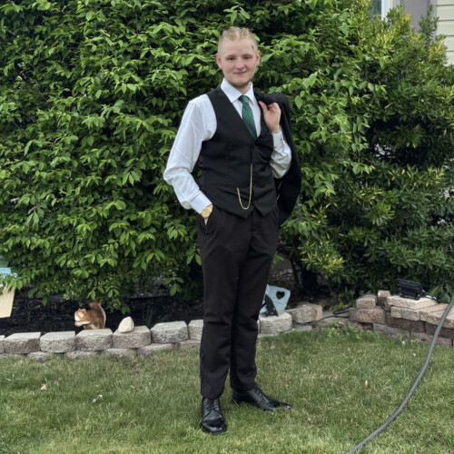 Ryan Courtney ’29 in a suit.