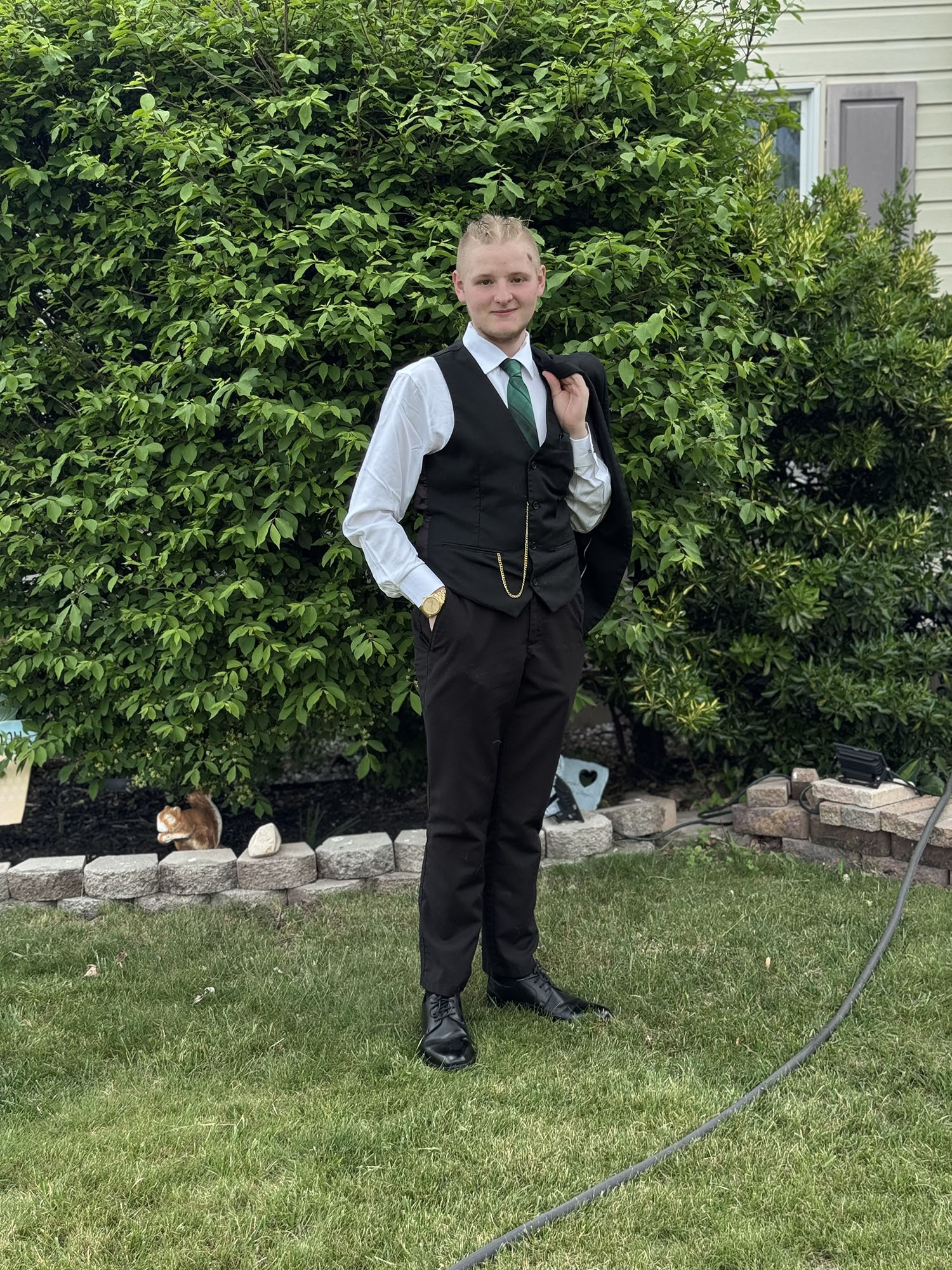 Ryan Courtney ’29 in a suit.