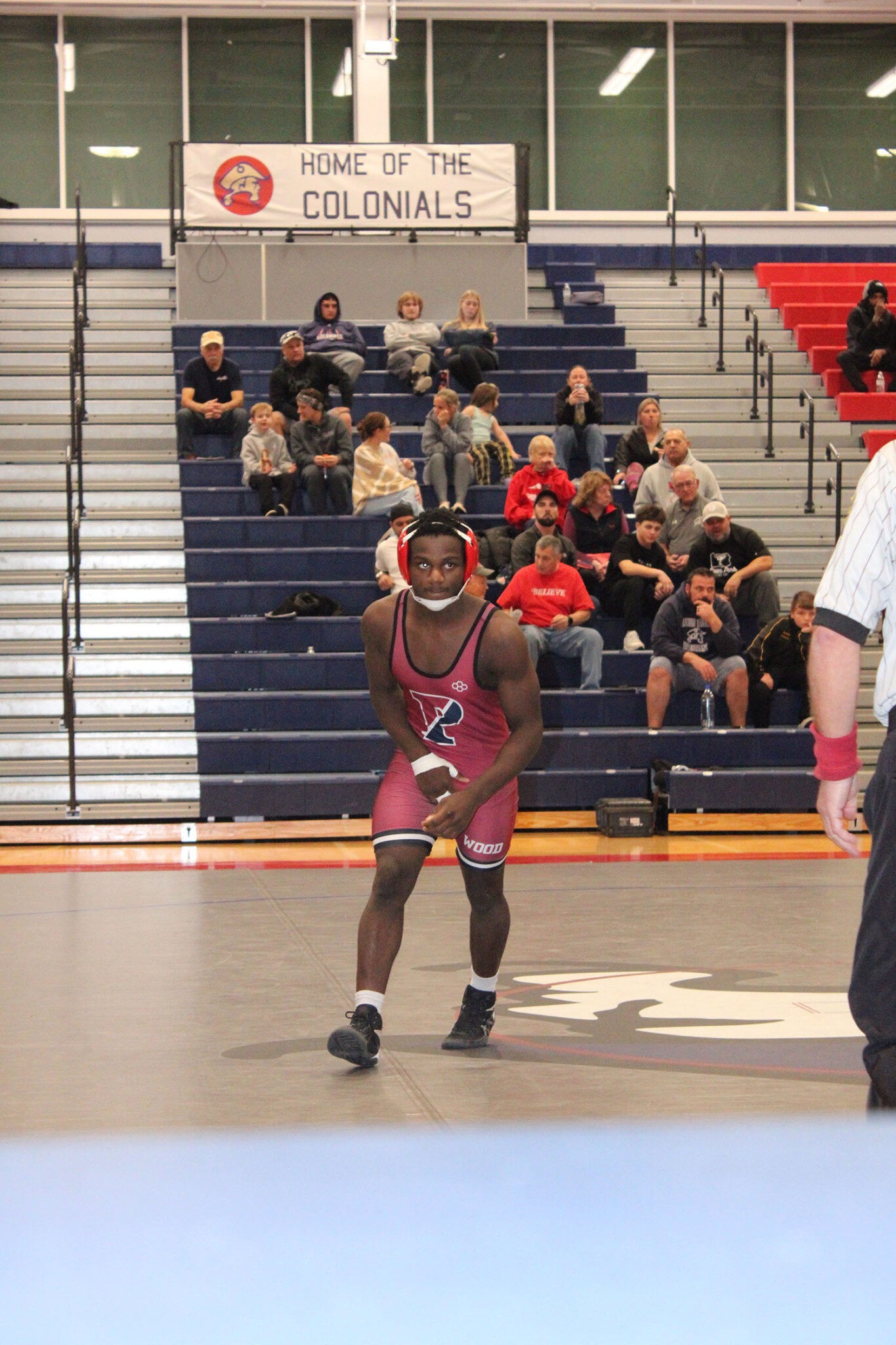 Taiwo Mogaji ’29 on the wrestling mat.