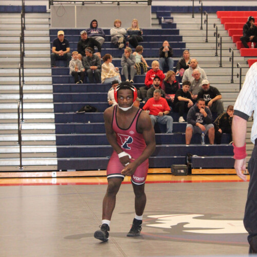 Taiwo Mogaji ’29 on the wrestling mat.