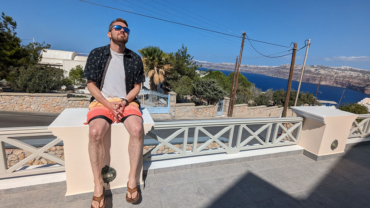 Chris Murray ’27DPT sitting on a railing.