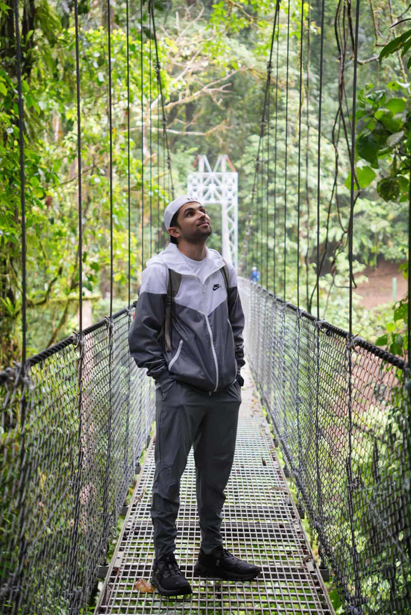 Jay Mehta ’20M, ’28EdD standing on a bridge.