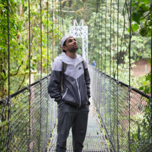 Jay Mehta ’20M, ’28EdD standing on a bridge.