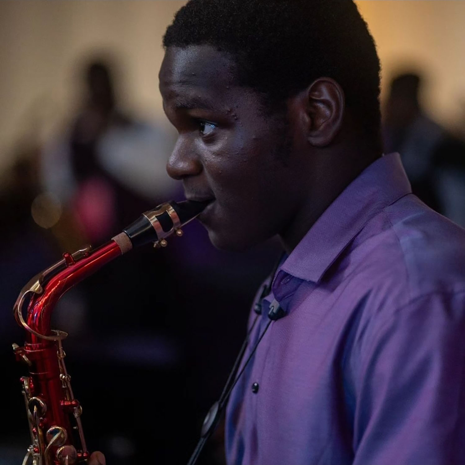 Kehinde Mogaji ’29 playing an instrument.