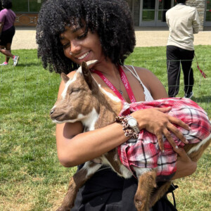 Trinity Smith ’27 holding a goat