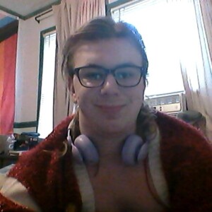 Phoenyx Thomas '27 smiles at the camera