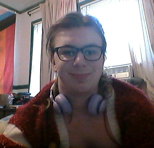 Phoenyx Thomas '27 smiles at the camera