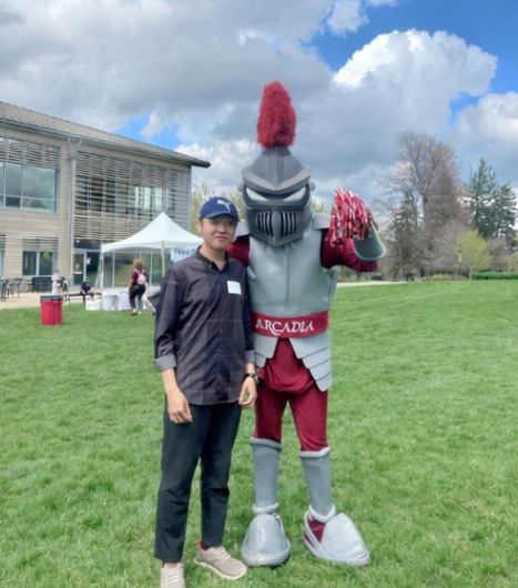 Chayhok Chhor ’27 with Archie the Knight.