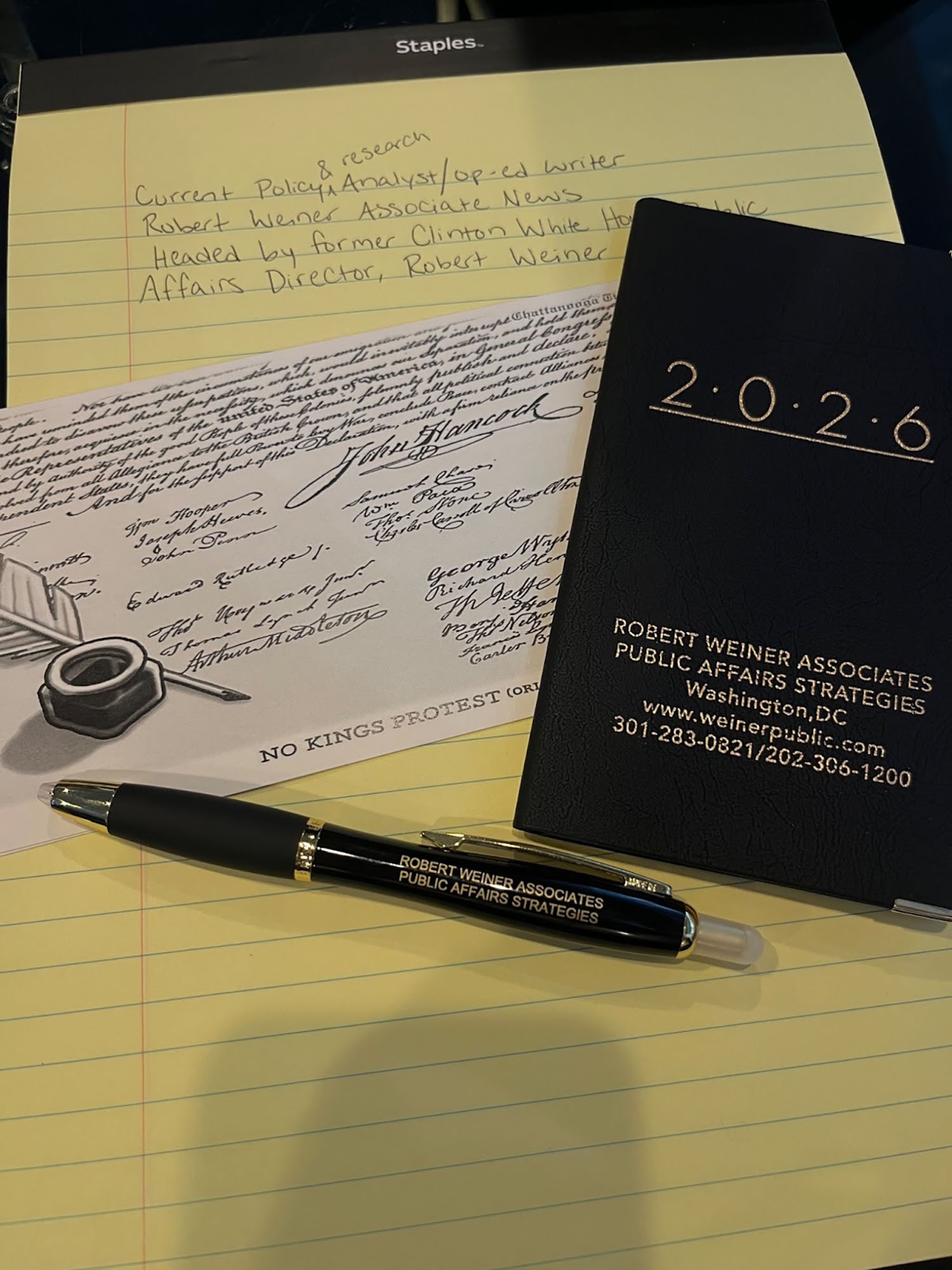 Lily Roberti's note book and press badge.