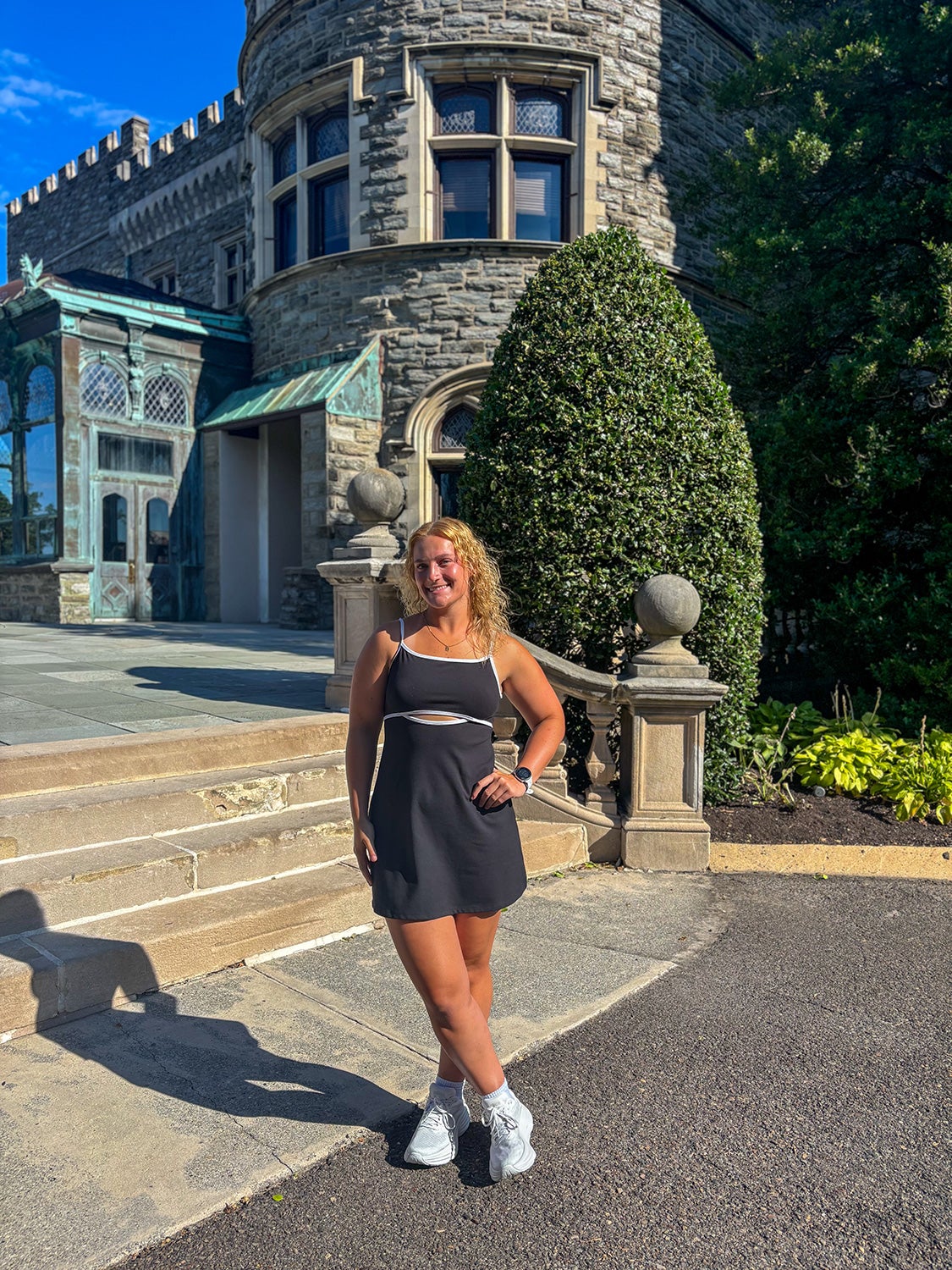 Abby Fuchs ’26 standing in front of Grey Towers Castle.