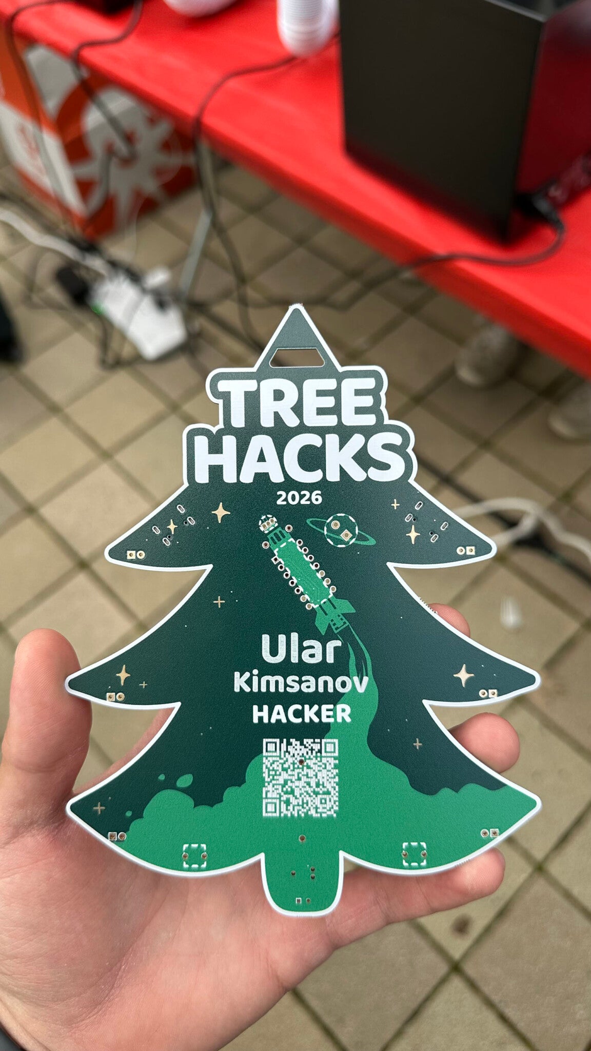 Ular Kimsanov's hacker badge at Treehacks.