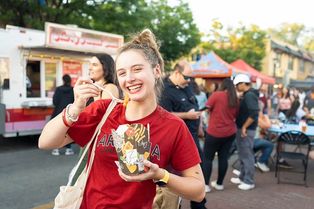 A student enjoys ice cream during the Rock the Knight & Glenside Food Truck Festival.