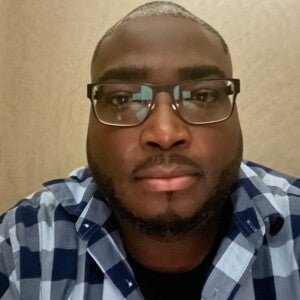 A headshot of Nii Tagoe, the new director of dining services at Arcadia University.