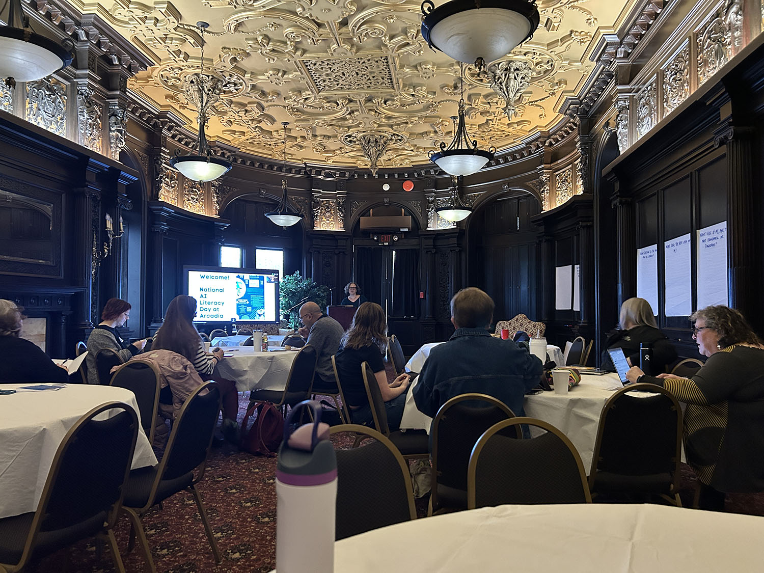 Presentations in the Castle Dining Room AI Literacy Day.