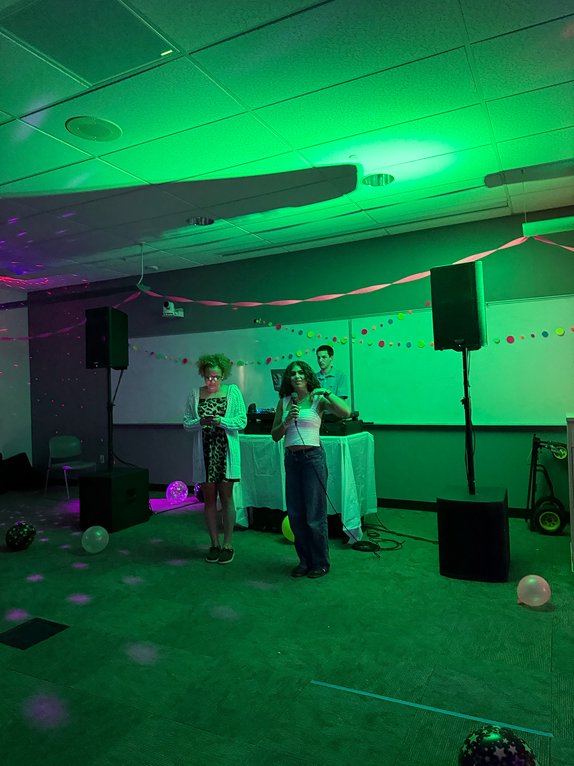 Students speaking at ArcadiaFTK's Dance All Knight.