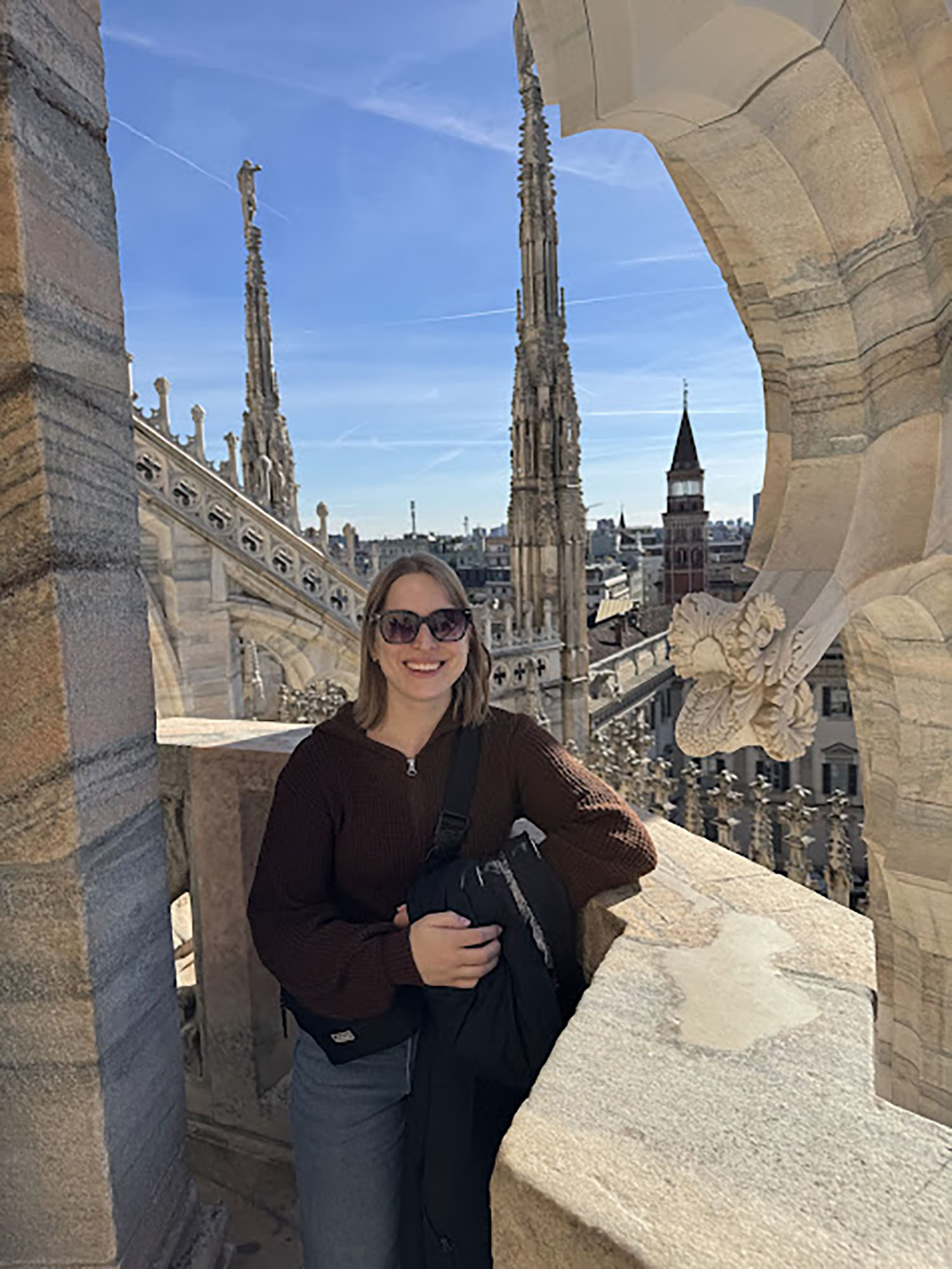 Alyssa Johnson ’26MPH on top of a cathedral.