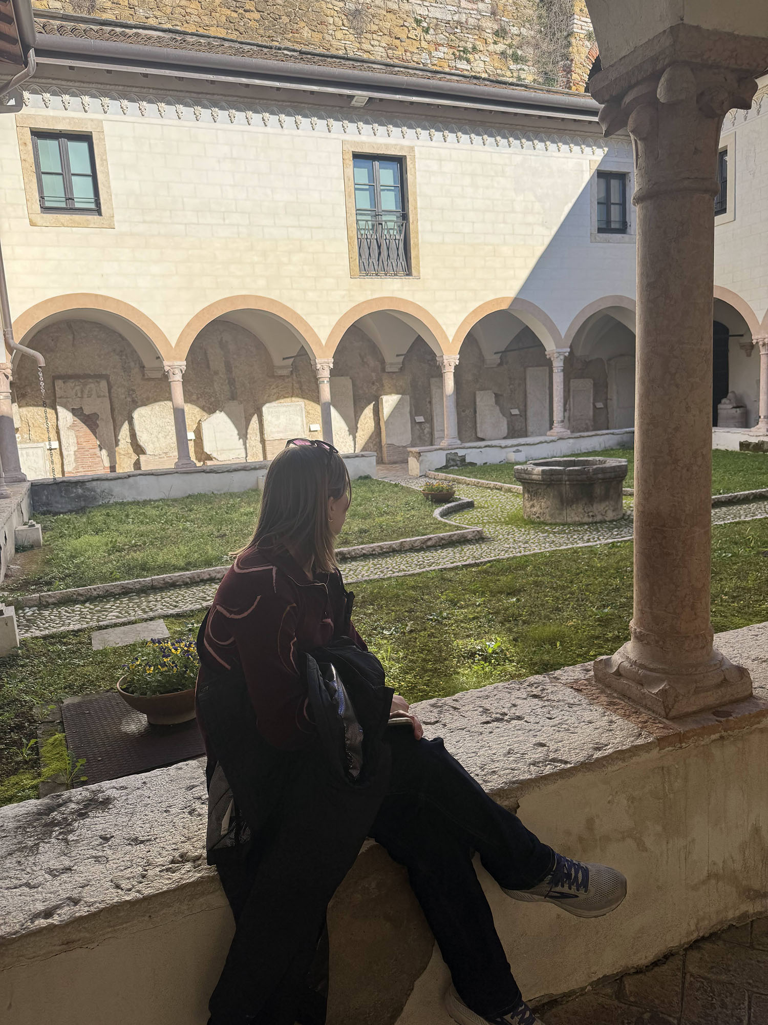 Alyssa Johnson ’26MPH looking at a courtyard.