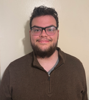 Honors Convocation 2026 award recipient Ian M. Lang smiles in his headshot.