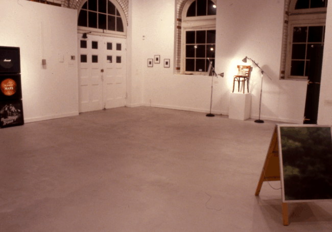 Photo of a white room with lights on