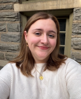 Honors Convocation 2026 award recipient Molly Russom smiles in her selfie.