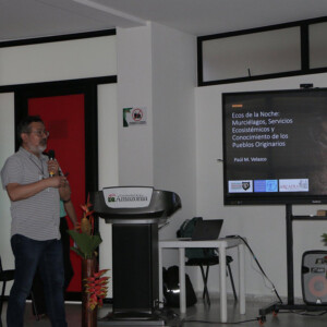 Arcadia's Dr. Paul Velazco gives a speech during a conference in Colombia.