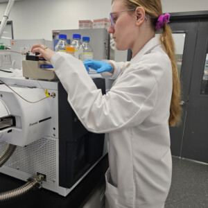 Mary Matya ’26M working with forensic equipment.