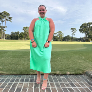 Taylor Migliore ’26 on a golf course.