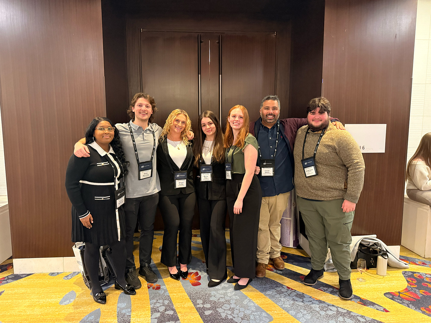Marina Rios ’26 and her peers at a conference.