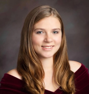 Honors Convocation 2025 award recipient Alexandra Deann Smith smiles in her headshot.