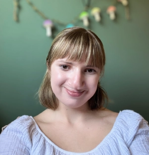 Honors Convocation 2025 award recipient Allison Elizabeth Schmidt smiles in her headshot.