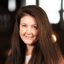 Honors Convocation 2025 award recipient Dr. Heather F. McClintock smiles in her headshot.