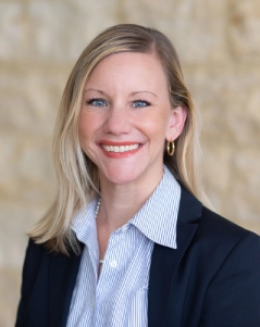 Honors Convocation 2026 award recipient Dr. Julie Marie Skrzat smiles in her headshot.