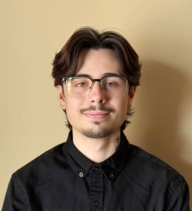 Honors Convocation 2025 award recipient James Philip Calvello smiles in his headshot.