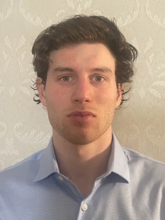 Honors Convocation 2025 award recipient Jared Shuter smiles slightly in his headshot.