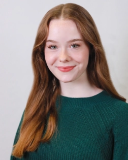 Honors Convocation 2026 award recipient Naomi Aldrich smiles in her headshot.
