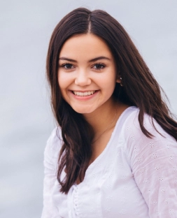 Honors Convocation 2025 award recipient Nicole Ann Burgon smiles in her headshot.