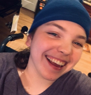 Honors Convocation 2025 award recipient Ryland McGinniss smiles in a selfie while wearing a blue beanie.