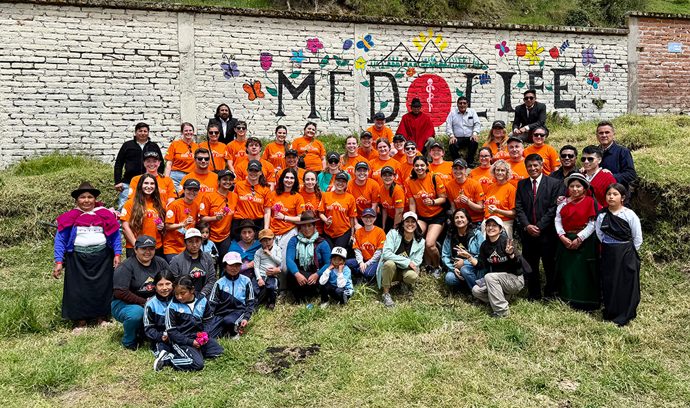 Arcadia Students, faculty, and others post for a picture together during a 2026 medical service trip in Ecuador.