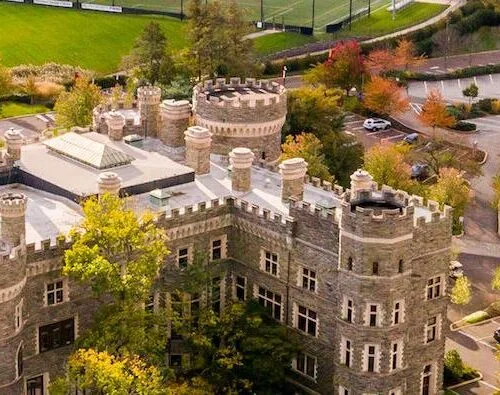 Drone view above Greys Tower Castle on Arcadia University Campus