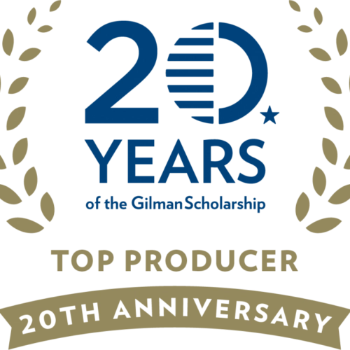 Blue and gray text logo for 20 Years of the Gilman Scholarship Top Producer