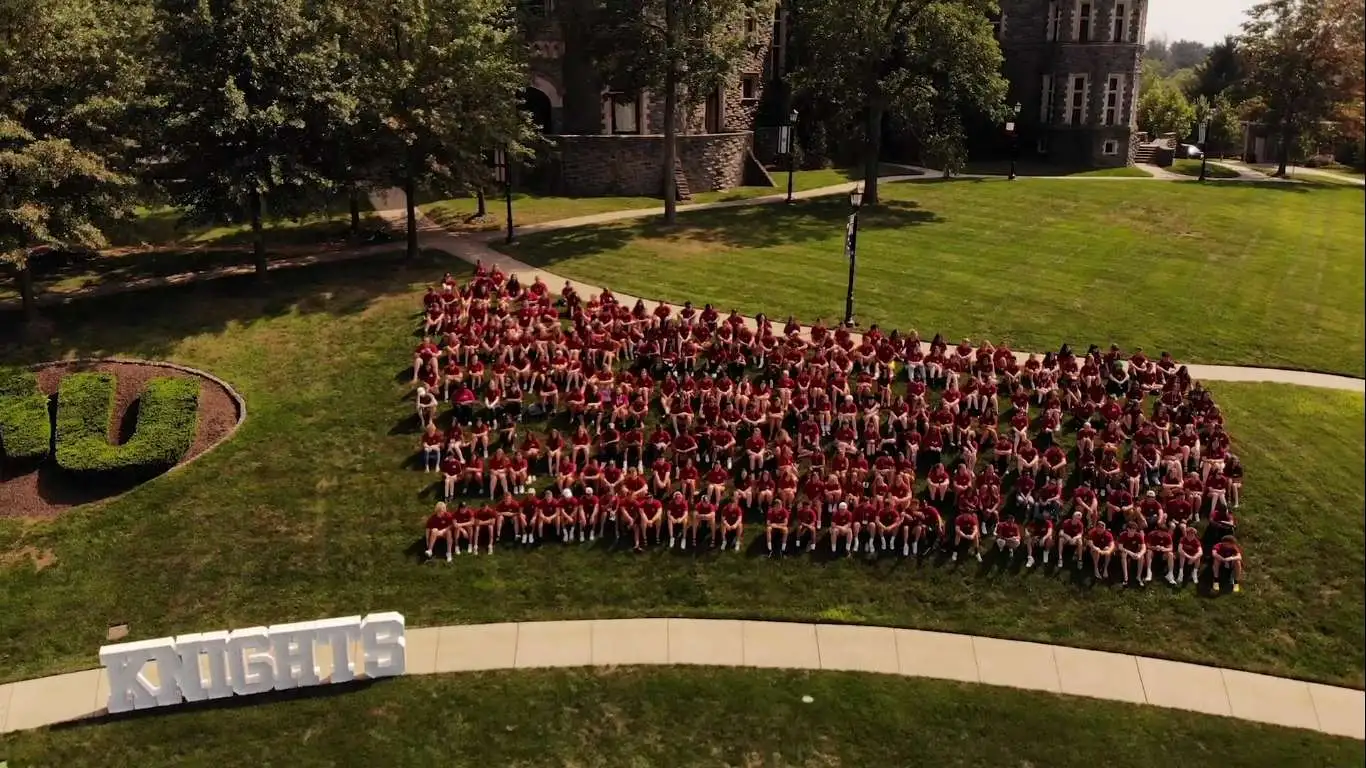 New Students gather on for a group photo on Haber Green